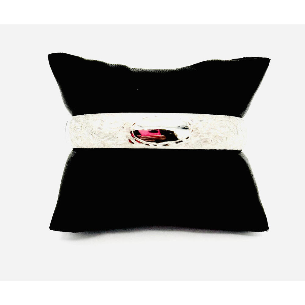 Sterling silver beautifully etched hinged bangle with blank space for monogram.